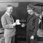 Jim Casey (left) presents the first Safe Driving Award to United Parcel Service driver Ray McCue in 1928. Photo courtesy of UPS archives.